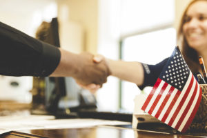 Shaking Hands with Flag